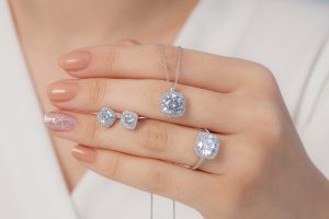 Square,Stone,Diamond,Jewelry,Set,In,White,Outfit,Lady,Hands